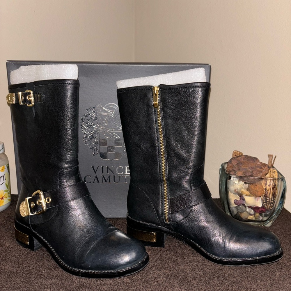 Black boots; gold hardware w/inside zipper; very nice & comfortable.